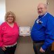Early McKnight presents Caring-In-Action award to Jennifer Cobb